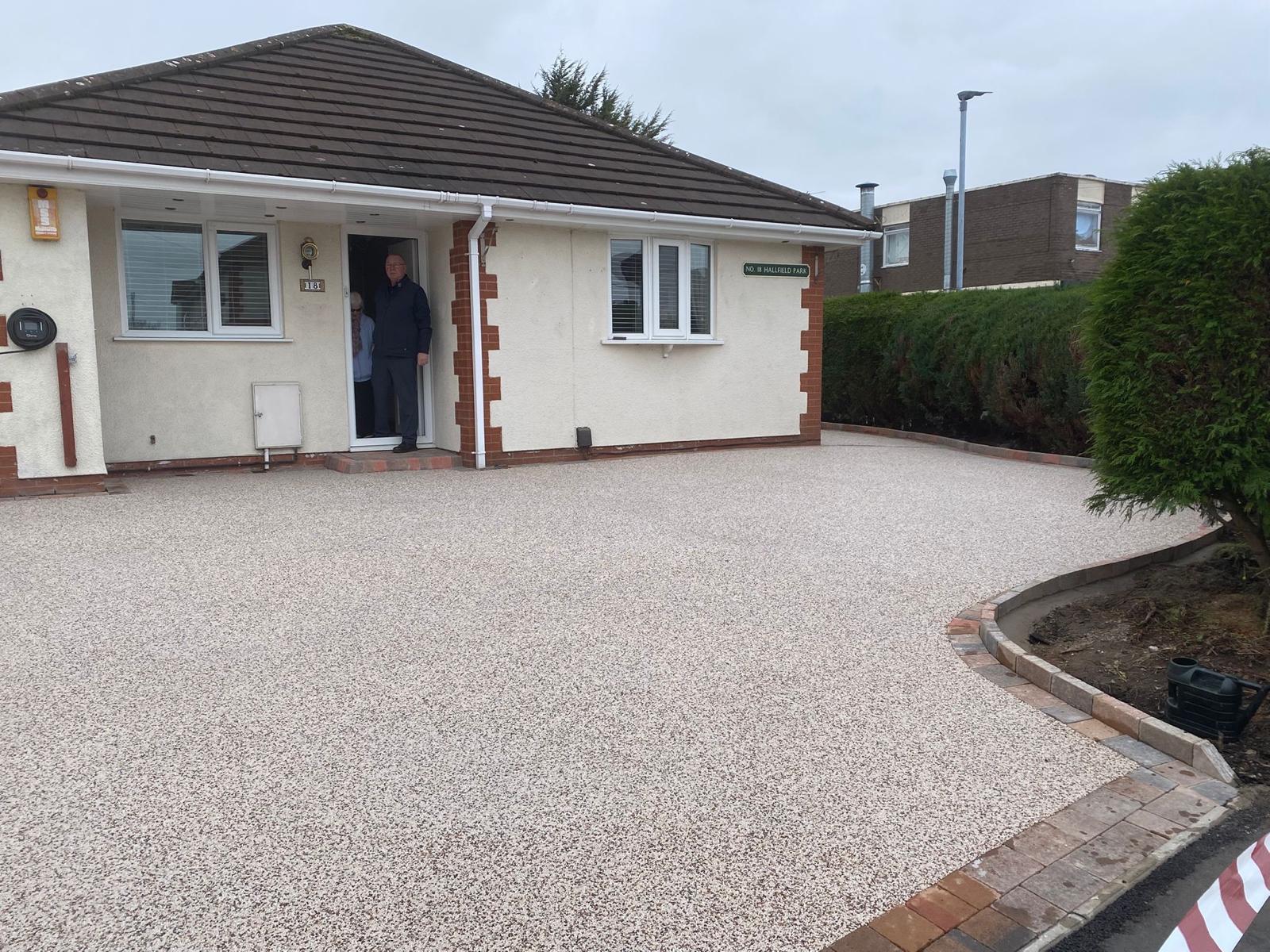 Completed buff resin-bound driveway