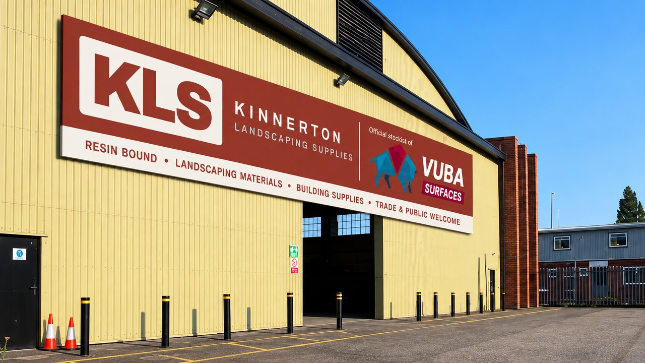 Frontage of the Kinnerton Landscaping Supplies depot in Deeside with the KLS sign and roller shutter doors