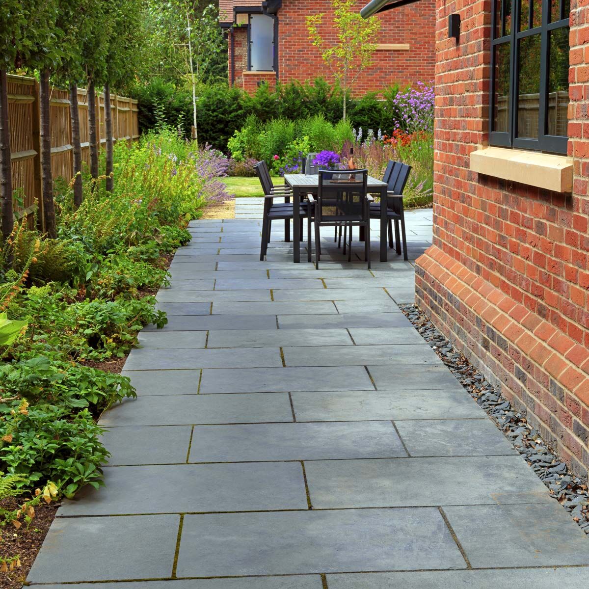 Kadapha Black Limestone Paving Slabs - Sawn Edge, Light Riven Patio Paving Slabs