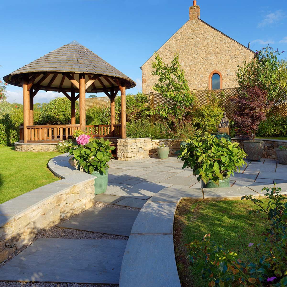 Light Grey (18 mm Calibrated) - Riven Grey Indian Sandstone Patio Paving Slabs by Pavestone - Natural Sandstone Garden Paving